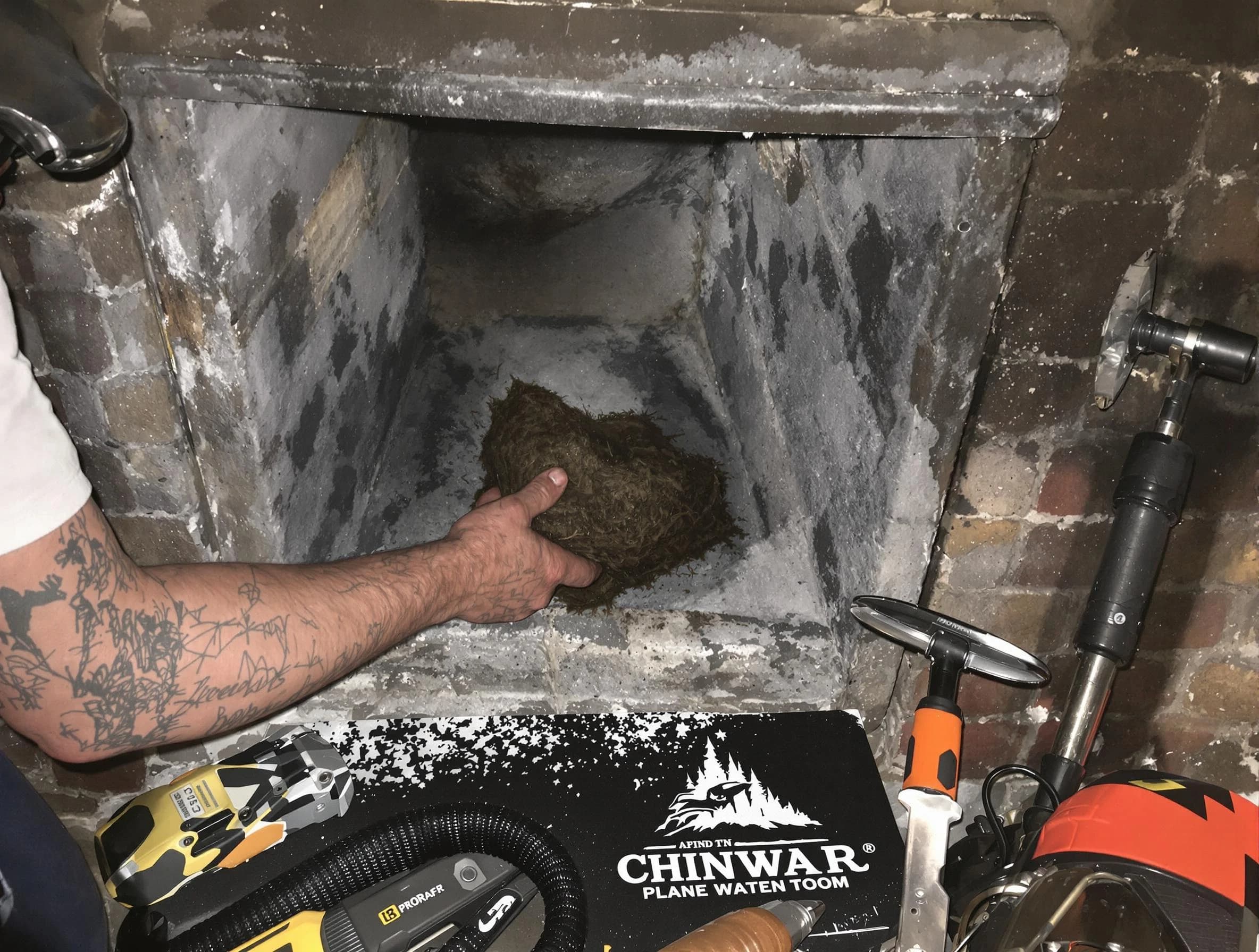 Rahway Chimney Sweep safely removing debris and screening chimney in Rahway, NJ